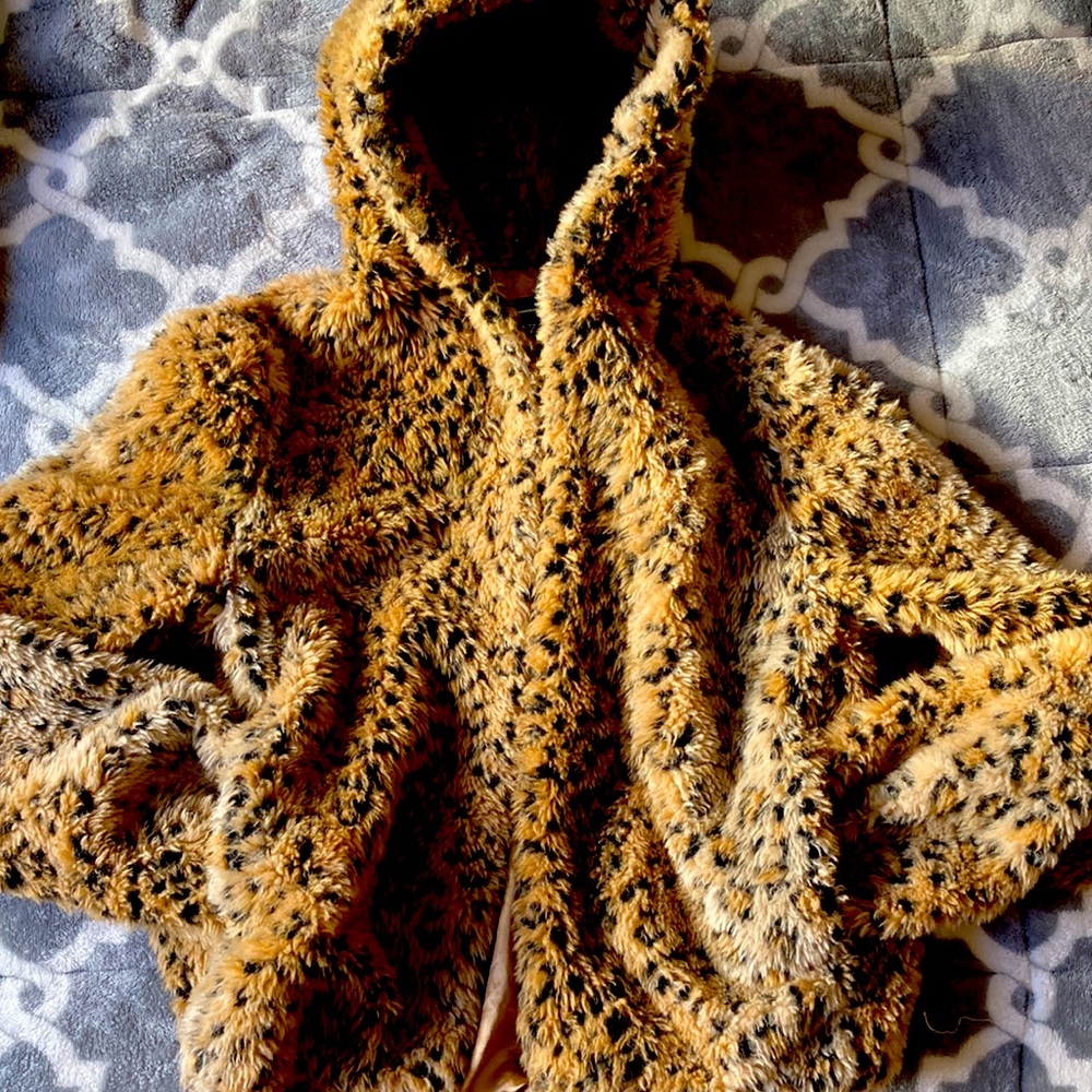 Faux fur jacket with hood and pockets